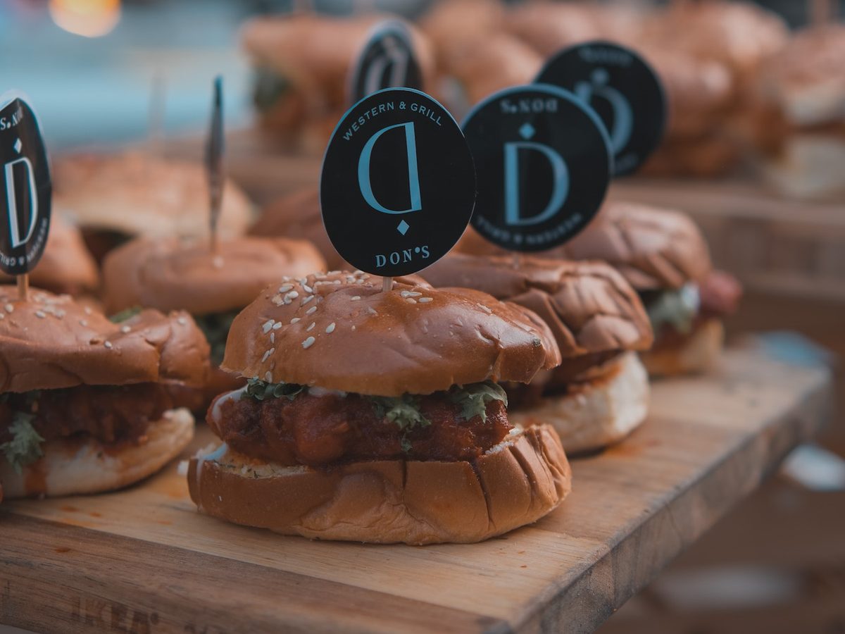Gourmet burgers on a wooden board